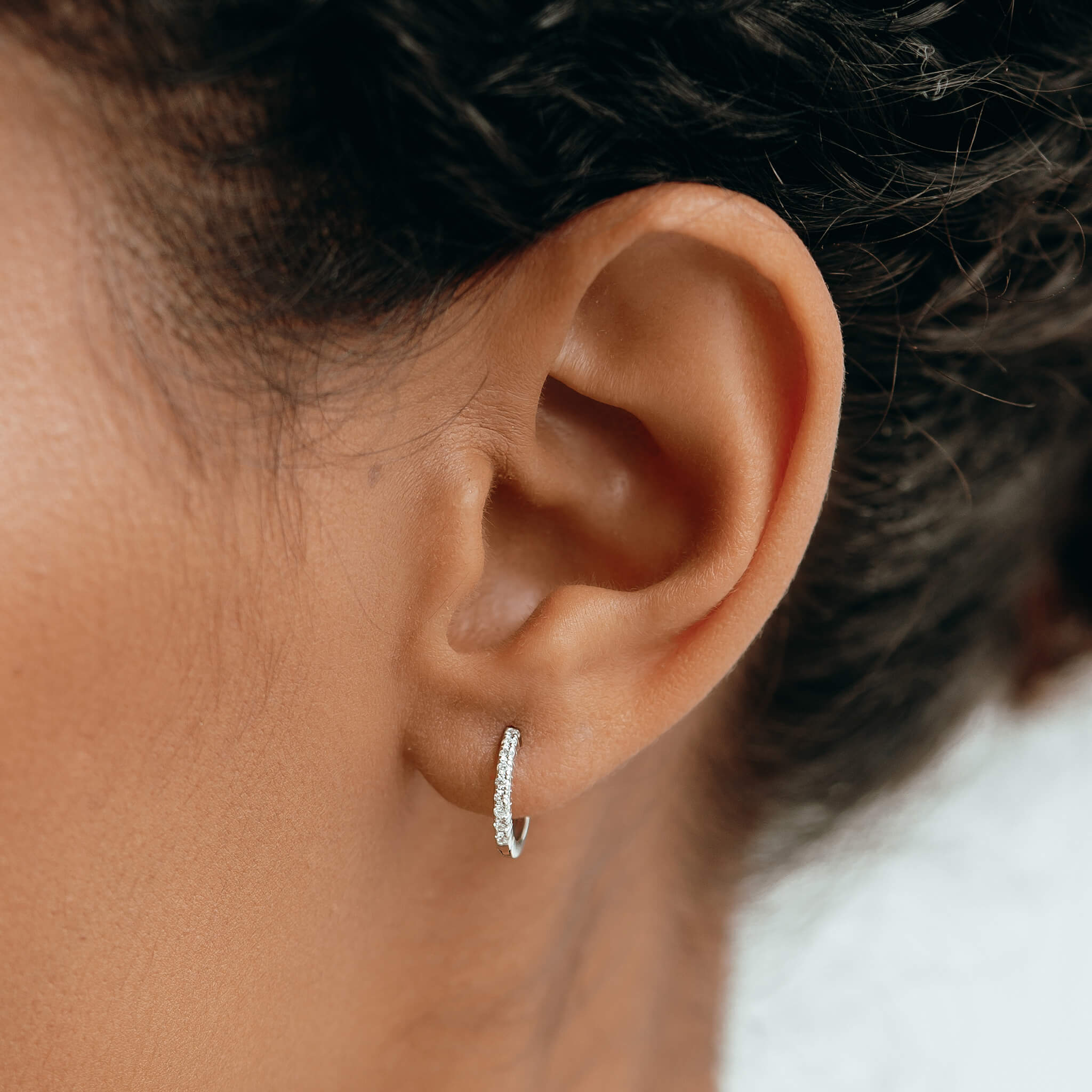 14k White Gold Diamond Huggie Earrings - Susanna